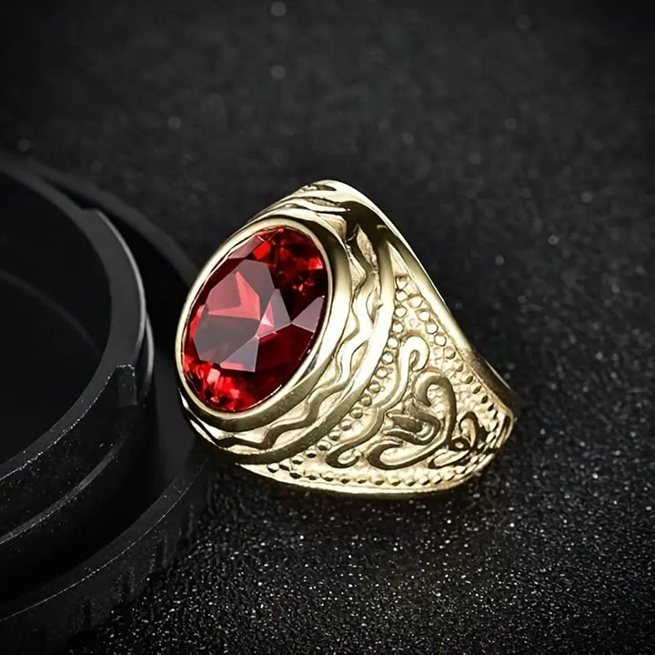 Engraved gold ring with ruby