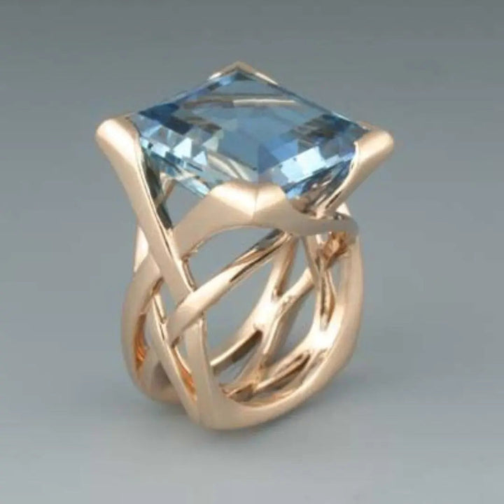 Rose Gold Ring with Blue Zirconia